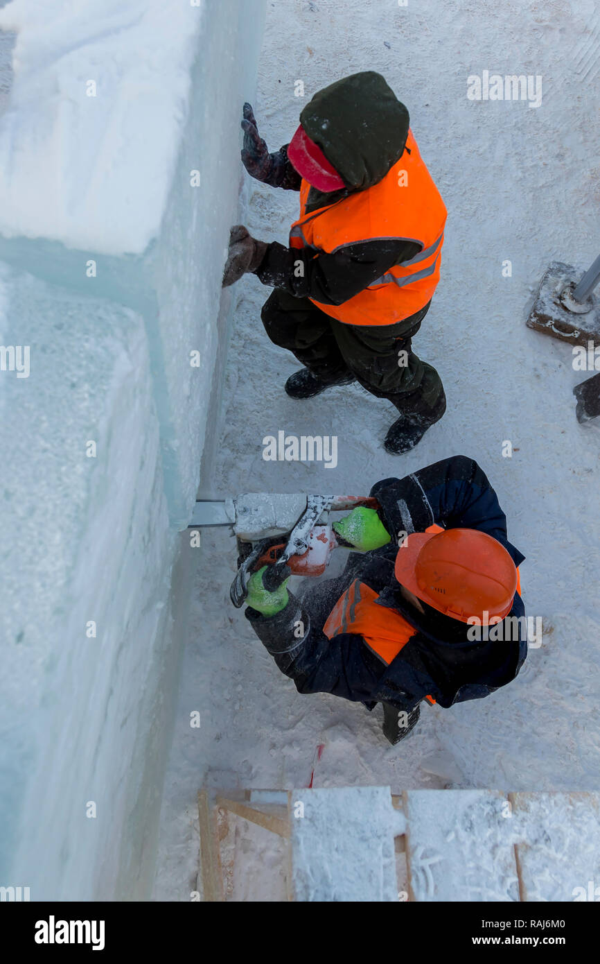 Installers are building an ice town of ice blocks Stock Photo Alamy