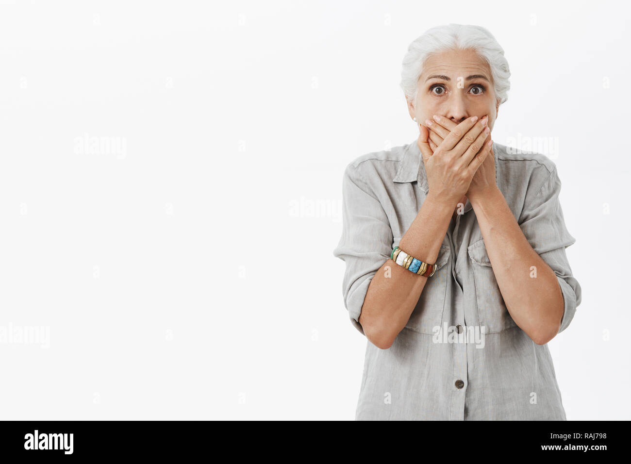 Horrified elderly woman hi-res stock photography and images - Alamy