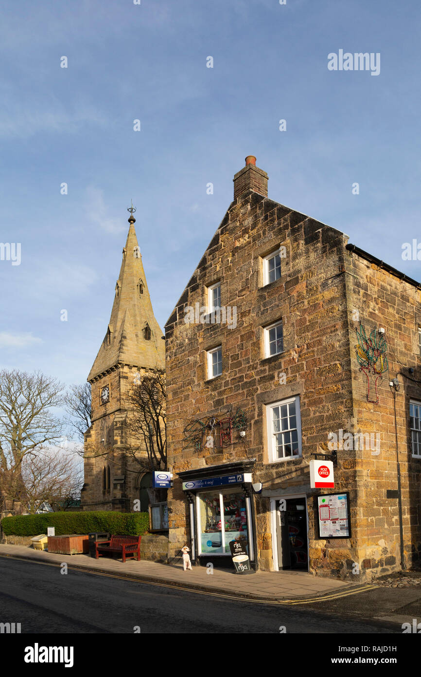 The post office and parish church of St John at Alnmouth in