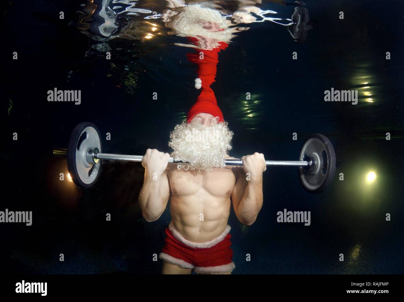 Santa lifting weights, under water, Odessa, Ukraine, Eastern Europe