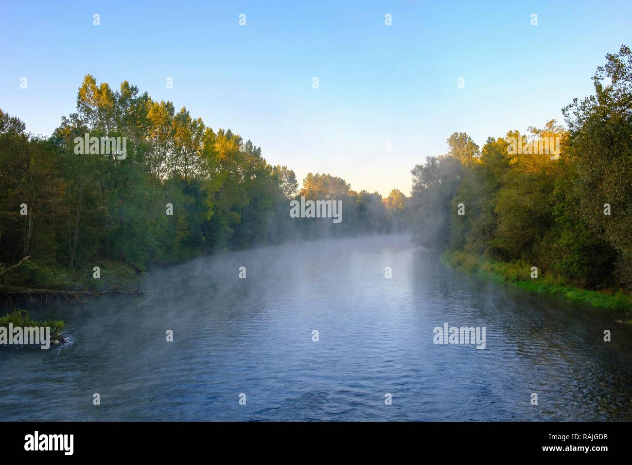 Isar with wafts of mist at sunrise, nature reserve Isarauen near Oberhummel, district of Freising, Upper Bavaria, Bavaria Stock Photo