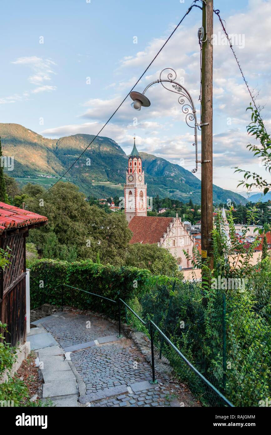Footpath, Tirolersteig with view of Sankt Nikolaus parish church, Parrocchia San Nicolò, city view, old town, Meran, Trentino Stock Photo