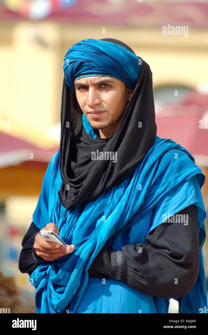 Bedouin man with mobile phone, Tunisia, Africa Stock Photo