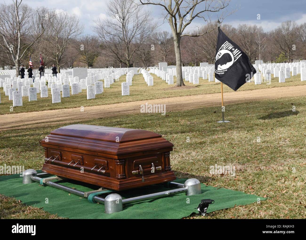 The remains of U.S. Army Master Sgt. Ira V. Miss, Jr., sit graveside