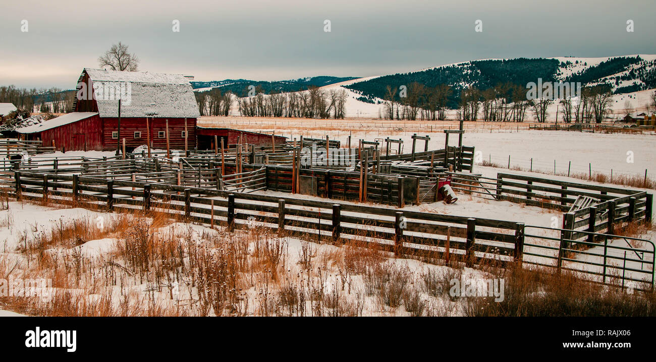 Old red barn and cattle pens along Montana Highway 1 near Philipsburg, Montana. Stock Photo