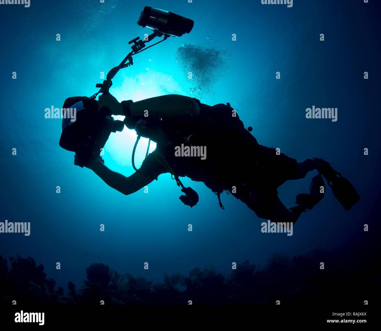 Mass Communication Specialist 1st Class Blake Midnight, assigned to