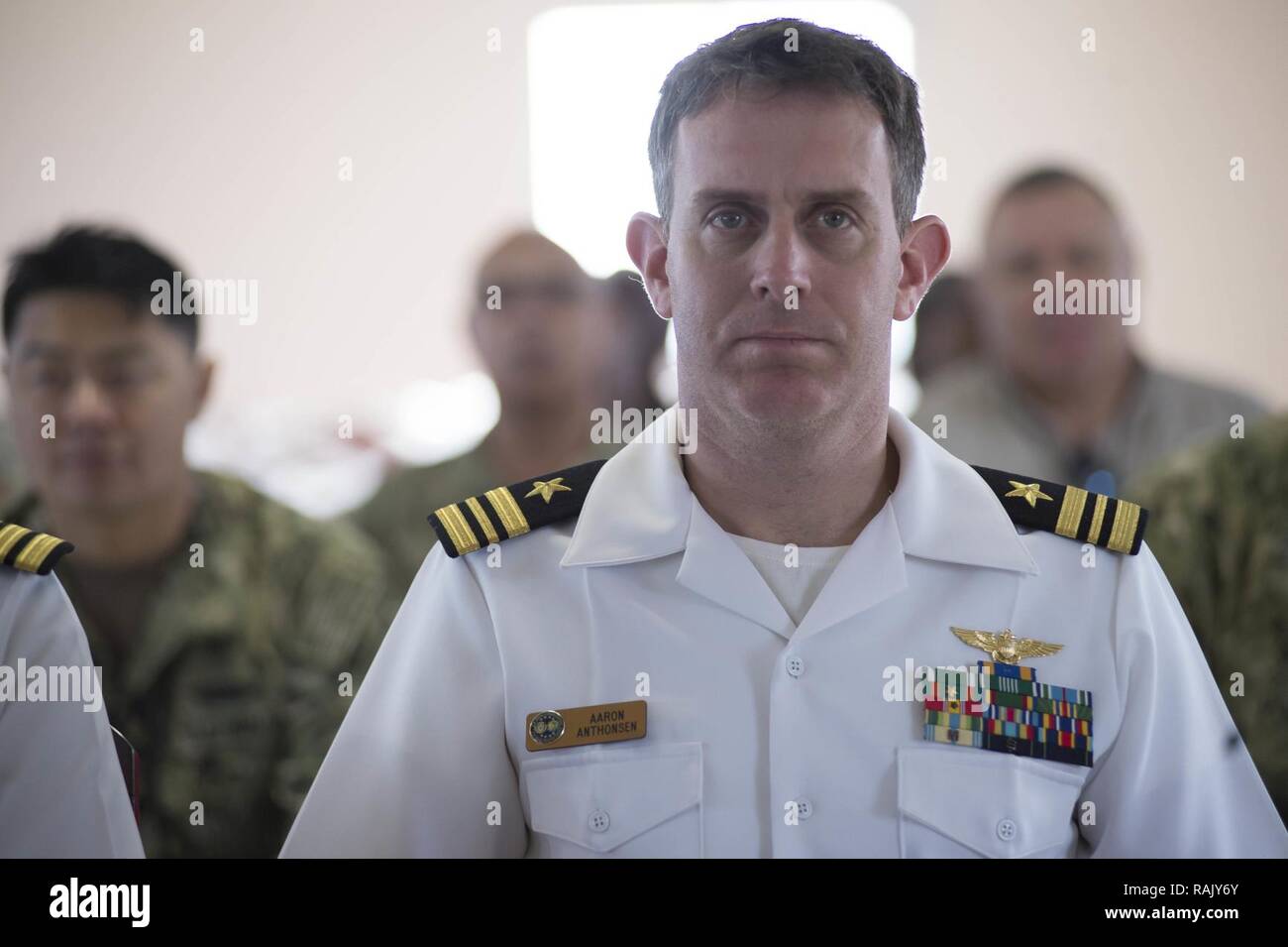 U.S. Navy Lt. Cmdr. Aaron Anthonsen, Officer in Charge of Exercise Control Group, attends the Exercise Cutlass Express 2017 closing ceremony at a Djibouti Coast Guard base in Djibouti City, Djibouti, Feb. 8, 2017. Exercise Cutlass Express 2017, sponsored by U.S. Africa Command and conducted by U.S. Naval Forces Africa, is designed to assess and improve combined maritime law enforcement capacity and promote national and regional security in East Africa. Stock Photo