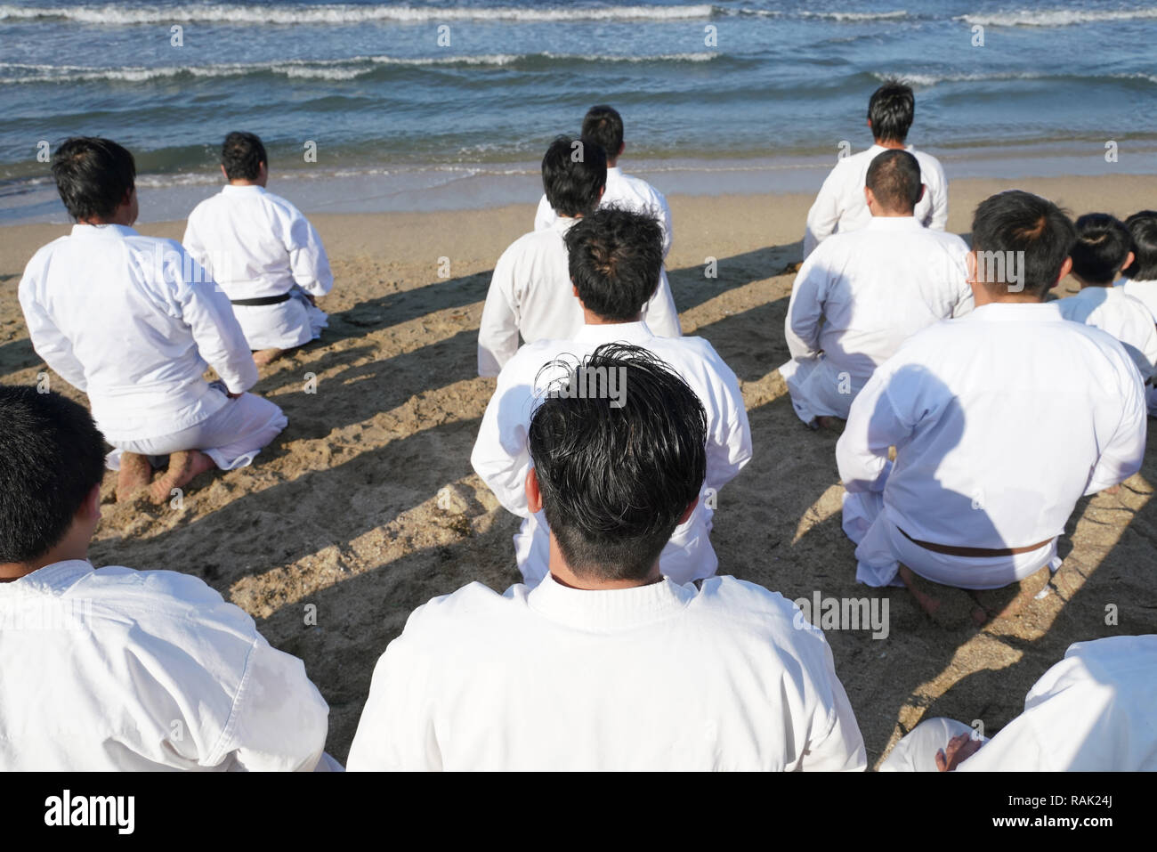 Japanese karate martial arts, spiritual sitting at the beach Stock Photo