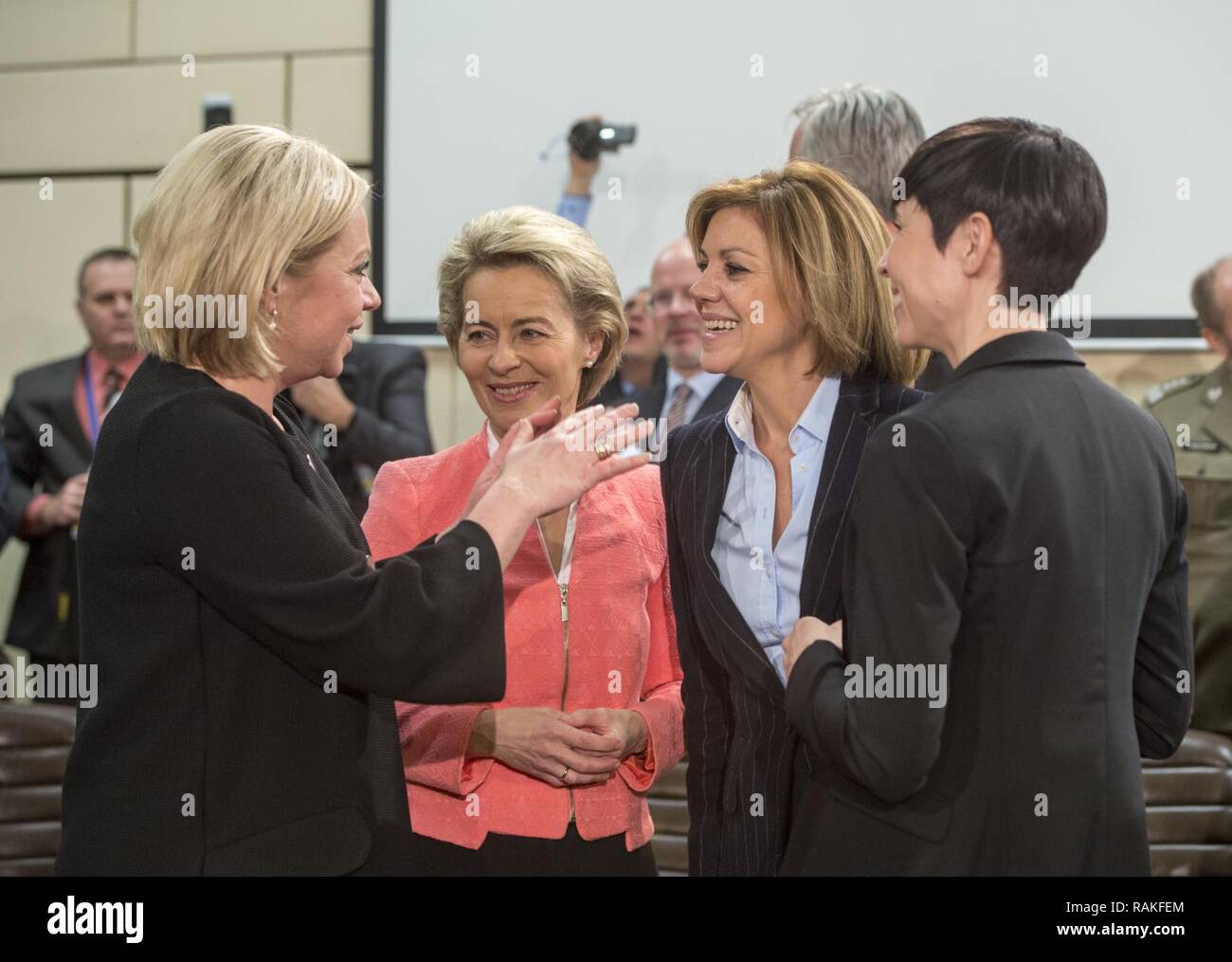 Female ministers of defense talk before a meeting of the North Atlantic Council the NATO Headquarters in Brussels, Belgium, Feb. 15, 2017. From left to right are Jeanine Hennis-Plasschaert (Netherlands), Ursula von der Leyen (Germany), Maria Dolores de Cospedal Garcia (Spain) and Ine Marie Eriksen Soreide. Stock Photo
