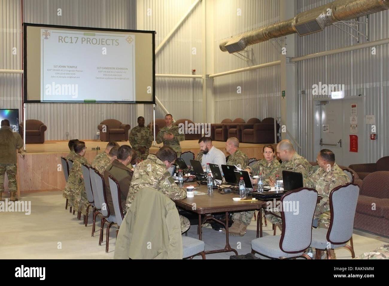 1st Lt. John Temple and 1st Lt. Cameron Johnson, during the Final Planning Conference hosted from February 8th to February 10th in Mihail Kogălniceanu, Romanina, present designs and specifications for projects to be built by a multi-national task force in Cincu, Romania during the initiative Resolute Castle 2017. Stock Photo