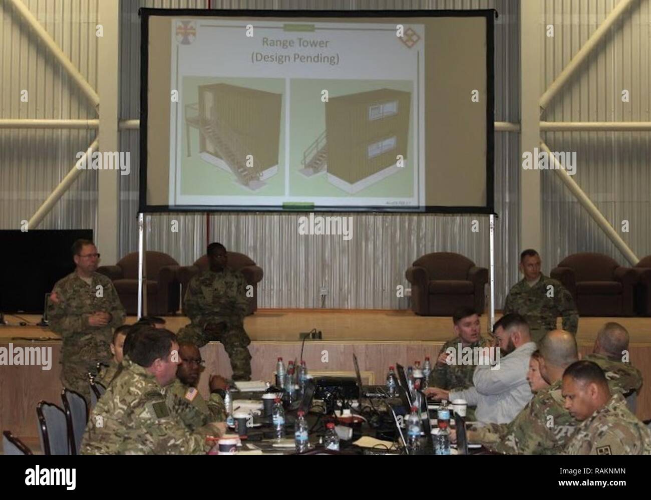 Maj. Donald Price, 1st Lt. Johnson, and 1st Lt. Temple present Range Tower designs in Mihail Kogalniceanu, Romania; where they, as the primary representatives of the 926th Engineer Brigade Staff for Resolute Castle 2017, hosted a Final Planning Conference, solidifying the objectives for a multi-national task force operating in Cincu, Romania. Stock Photo