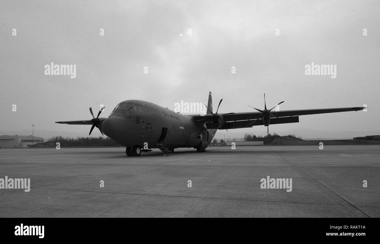 A 37th Airlift Squadron C-130J Super Hercules sits on the flightline on Ramstein Air Base, Germany, Feb. 10, 2017. The 37th AS has used a variety of aircraft since its activation as a unit in 1942, with the current aircraft being the C-130J. Stock Photo