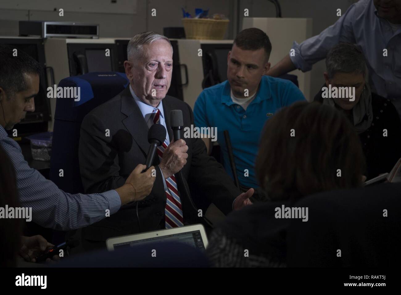Secretary of Defense Jim Mattis briefs media aboard an E-4B National Airborne Operations Center aircraft over the Atlantic Ocean Feb. 14, 2017, en route to Brussels, Belgium, for the NATO Defense Ministerial. Stock Photo