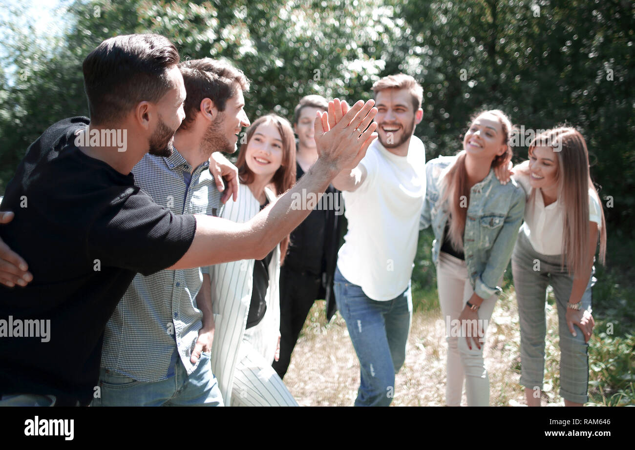 best friends give each other a high five. Stock Photo