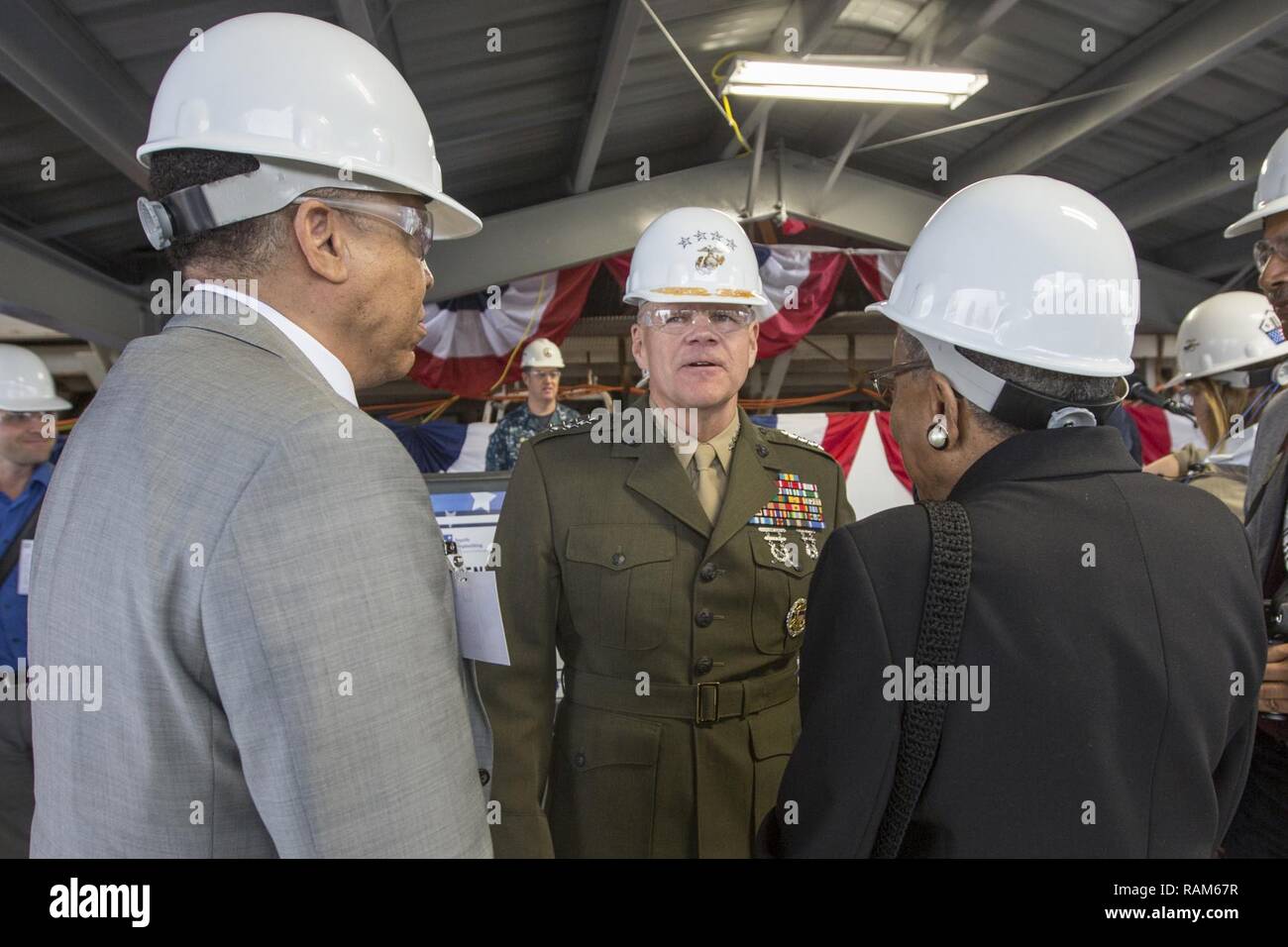 Commandant of the Marine Corps Gen. Robert B. Neller, center, speaks ...
