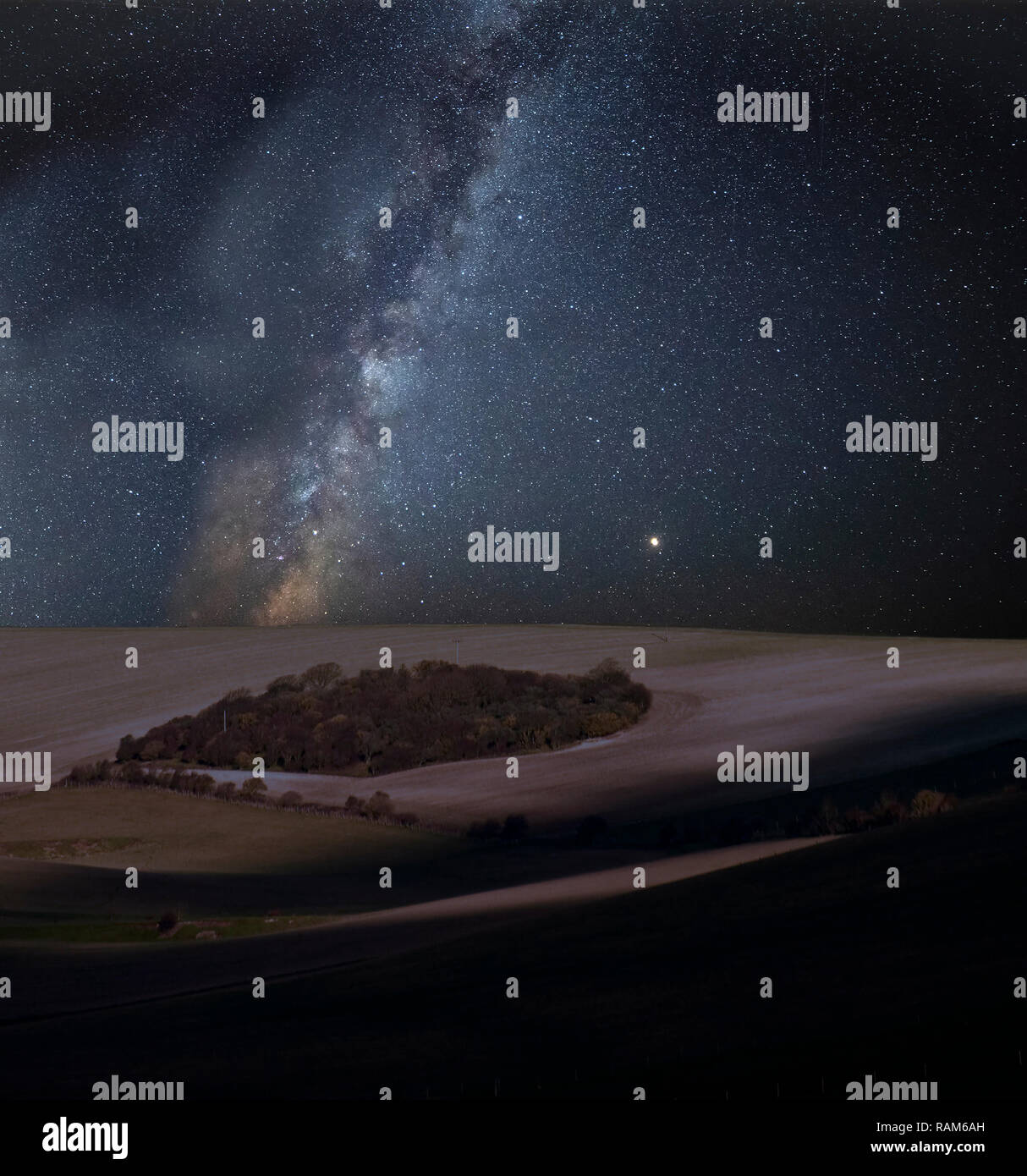 Stunning vibrant Milky Way composite image over landscape of ...
