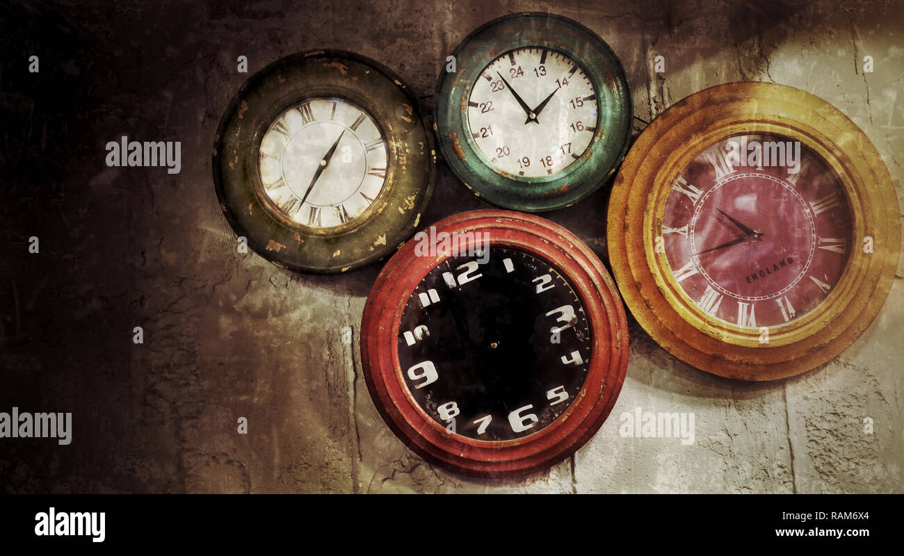 Abstract Retro Clocks on the Stone Wall Background Stock Photo