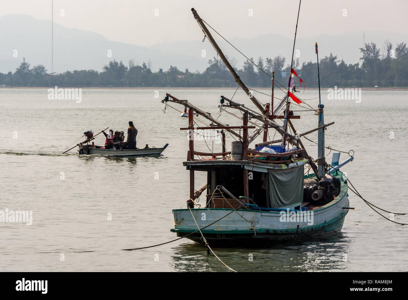 Fishemen and fishing boats Stock Photo