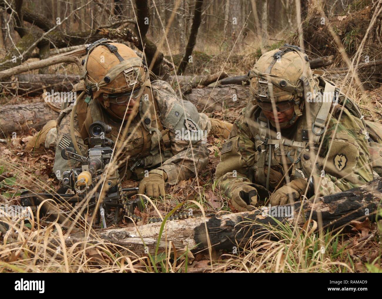 US soldiers providing overwatch during Joint Readiness Training Center exercises for pre-deployment preparation