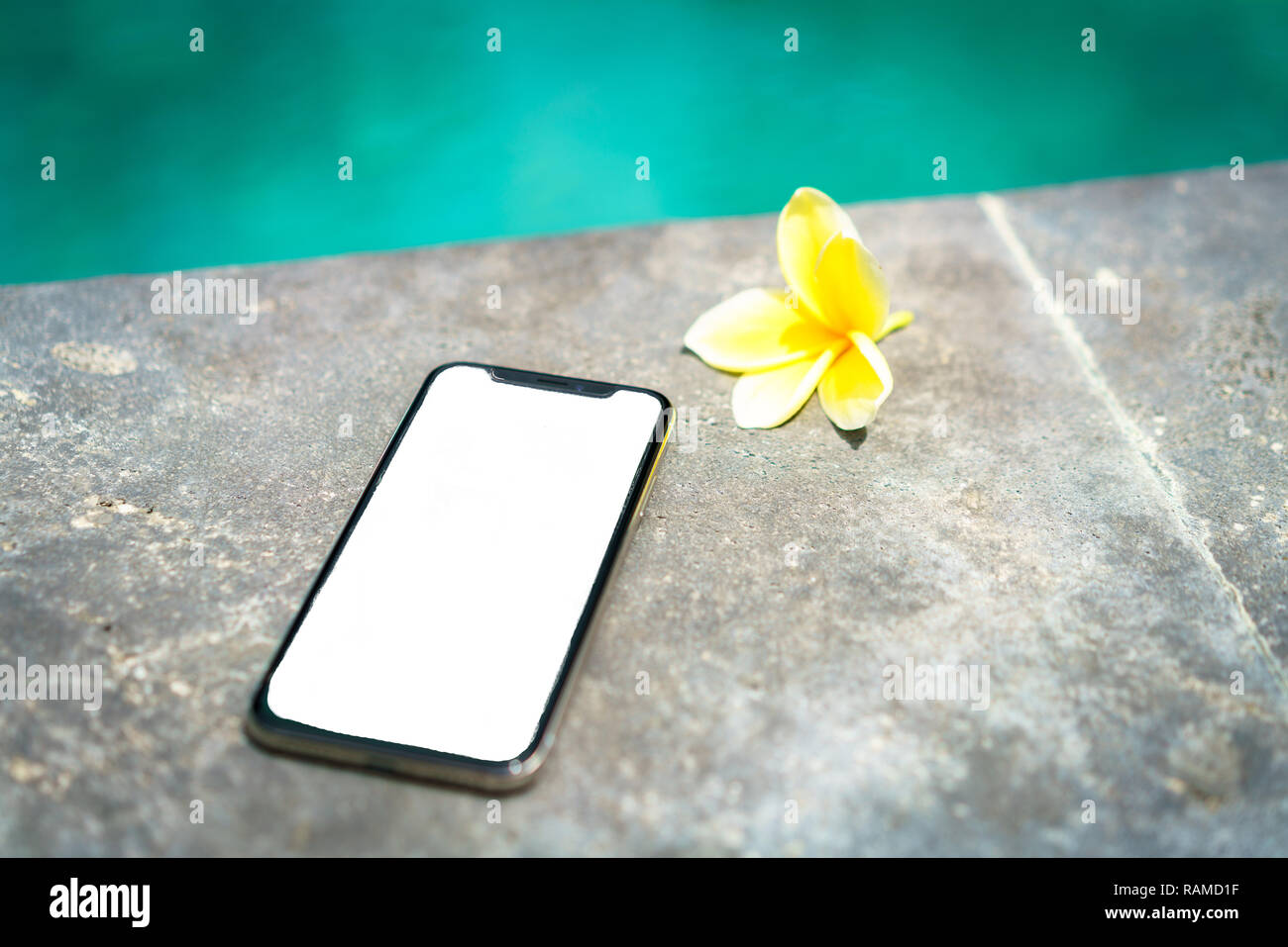 last generation smart phone x during holidays in indonesia Stock Photo