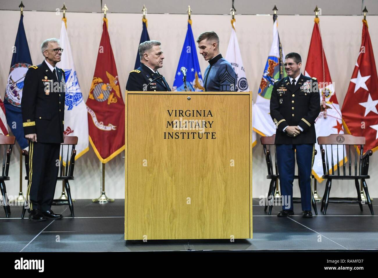 U.S. Army Chief of Staff Gen. Mark A. Milley listens to a cadet after he addressed the Corps of Cadets at the Virginia Military Institute, Lexington, Va., Feb. 8, 2017. Stock Photo
