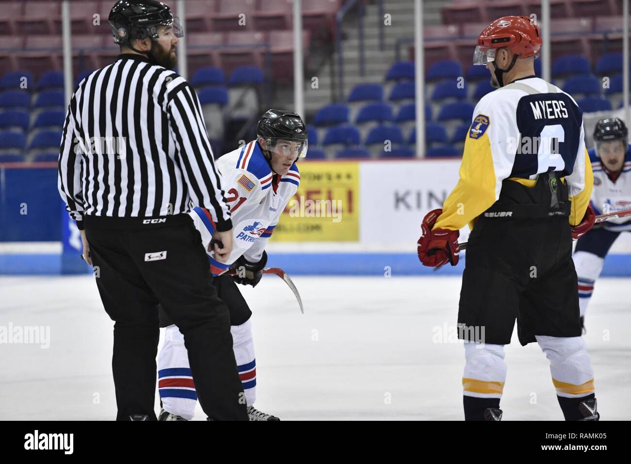 Members of the Charleston Patriots and the Charleston Enforcers play hockey during the 3rd Annual Matuskovic Charity Hockey Game at the North Charleston Coliseum & Performing Arts Center, Feb. 18, 2017. The game is played in memory of Joe Matuskovic, Charleston County Sherriff’s deputy, and other service members and first responders killed in the line of duty. Members of the Charleston Patriots are from Joint Base Charleston while members of the Charleston Enforcers are from the Charleston County Sheriff’s office and fire department.The Charleston Enforcers won the game with a final score of 1 Stock Photo