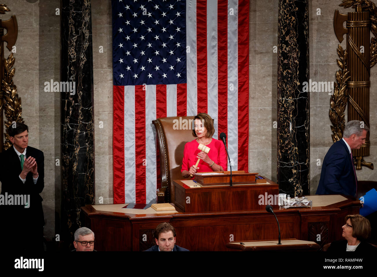 Beijing, USA. 3rd Jan, 2019. Nancy Pelosi (C) holds the gavel after being elected the new speaker of the U.S. House of Representatives on Capitol Hill in Washington, DC, the United States, on Jan. 3, 2019. Representative Nancy Pelosi, a California Democrat, was elected the new speaker of the U.S. House of Representatives Thursday, the first day of a new, divided Congress. Credit: Ting Shen/Xinhua/Alamy Live News Stock Photo
