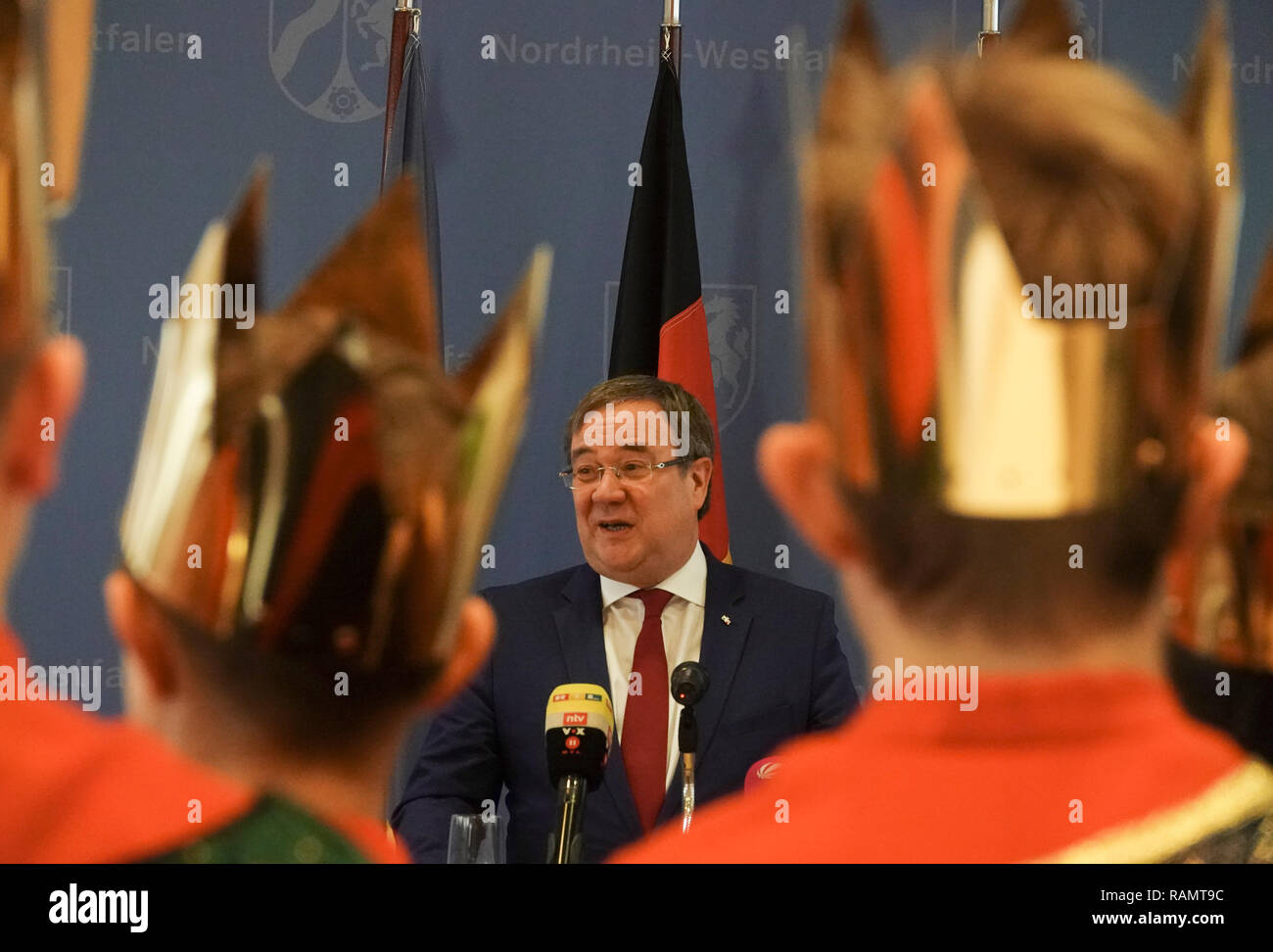 04 January 2019, North Rhine-Westphalia, Düsseldorf: North Rhine-Westphalia's Prime Minister Armin Laschet (CDU) welcomes Sternsinger to the State Chancellery in Düsseldorf. Laschet praised the use of the star singers as 'lived charity'. Photo: David Schwarz/dpa Stock Photo