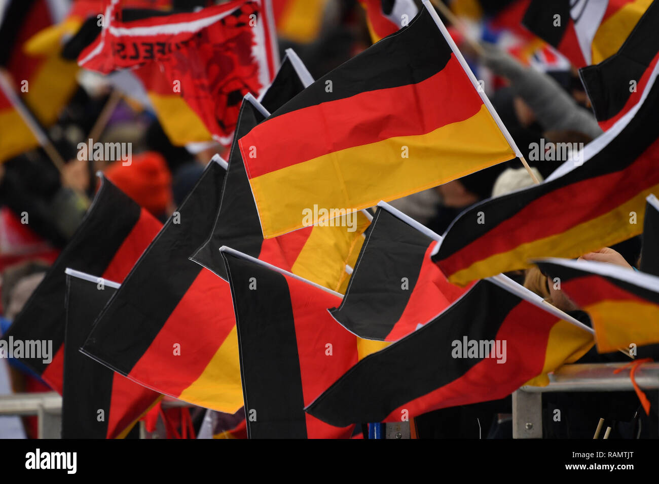 Garmisch Partenkirchen, Deutschland. 01st Jan, 2019. Feature, Randmotiv, Germany Flags, Flags, Faehnchen, Black Red Gold, 67th International Four Hills Tournament 2018/19. New Year's Jumping in Garmisch Partenkirchen on 01.01.2019. | usage worldwide Credit: dpa/Alamy Live News Stock Photo