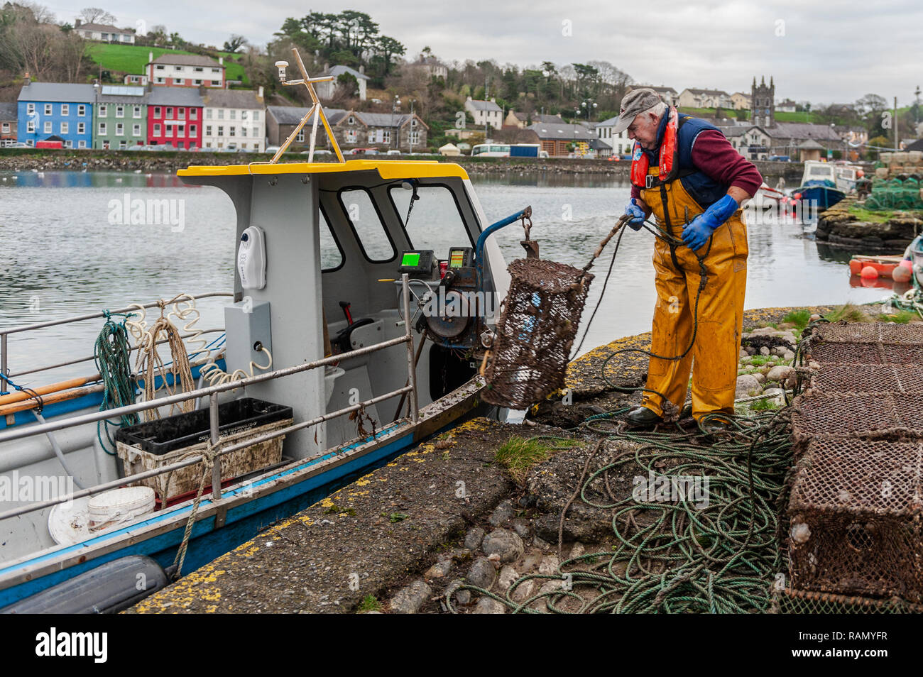 Bantry, West Cork, Ireland. 4th January, 2019. A fisherman unloads his crab pots after a fishing trip in Bantry Bay. Credit: Andy Gibson/Alamy Live News. Stock Photo