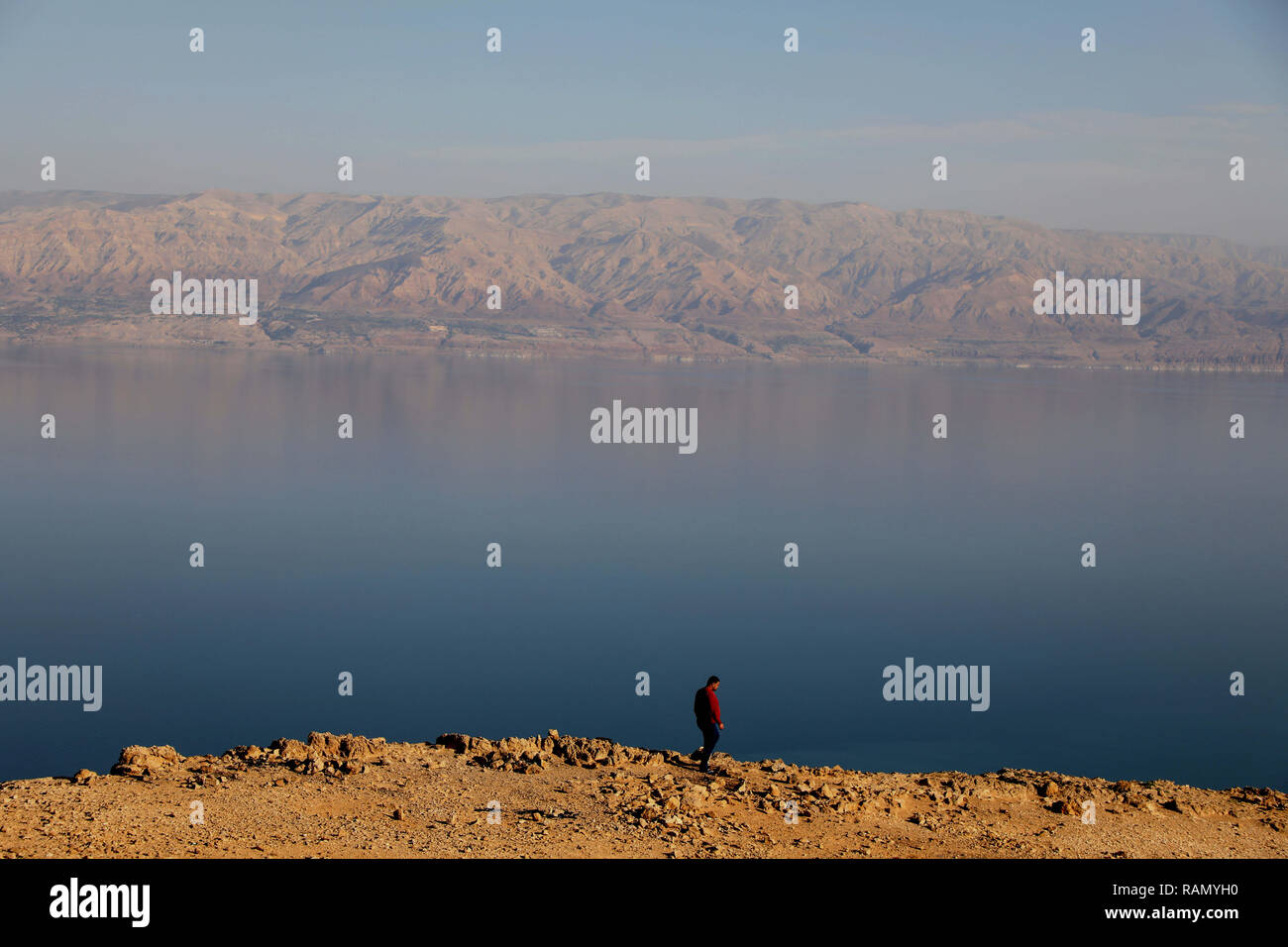 he Dea Sea near the Palestinian town of Jericho with its surrounding  natural scene. The area is a natural habitat for the black starling bird.  The Dead Sea is a salt lake