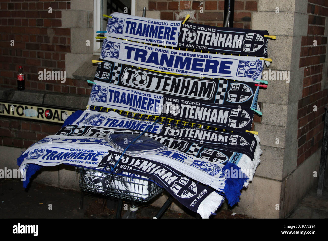 Birkenhead, UK. 4th January, 2019. Unofficial merchandise including half and half scarves on sale outside the stadium during the FA Cup Third Round match between Tranmere Rovers and Tottenham Hotspur at Prenton Park on January 4th 2019 in Birkenhead, England. Credit: PHC Images/Alamy Live News Stock Photo