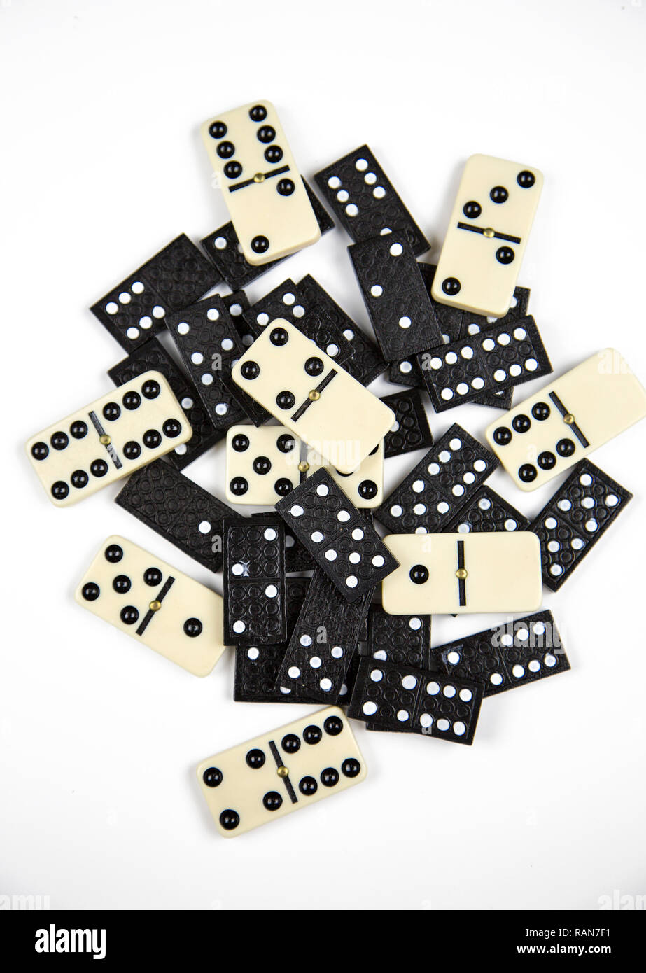 Domino Tiles Strategy Game Stones. Dominoes is a family of tile-based games  played with rectangular "domino" tiles. Each domino is a rectangular tile  Stock Photo - Alamy