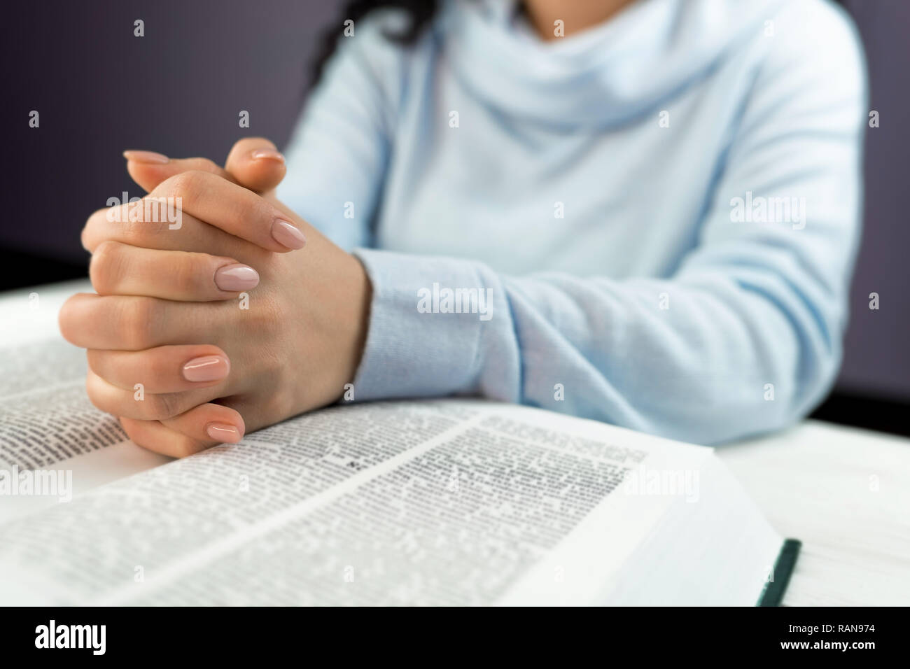 Asian girl reading bible in hi-res stock photography and images - Alamy