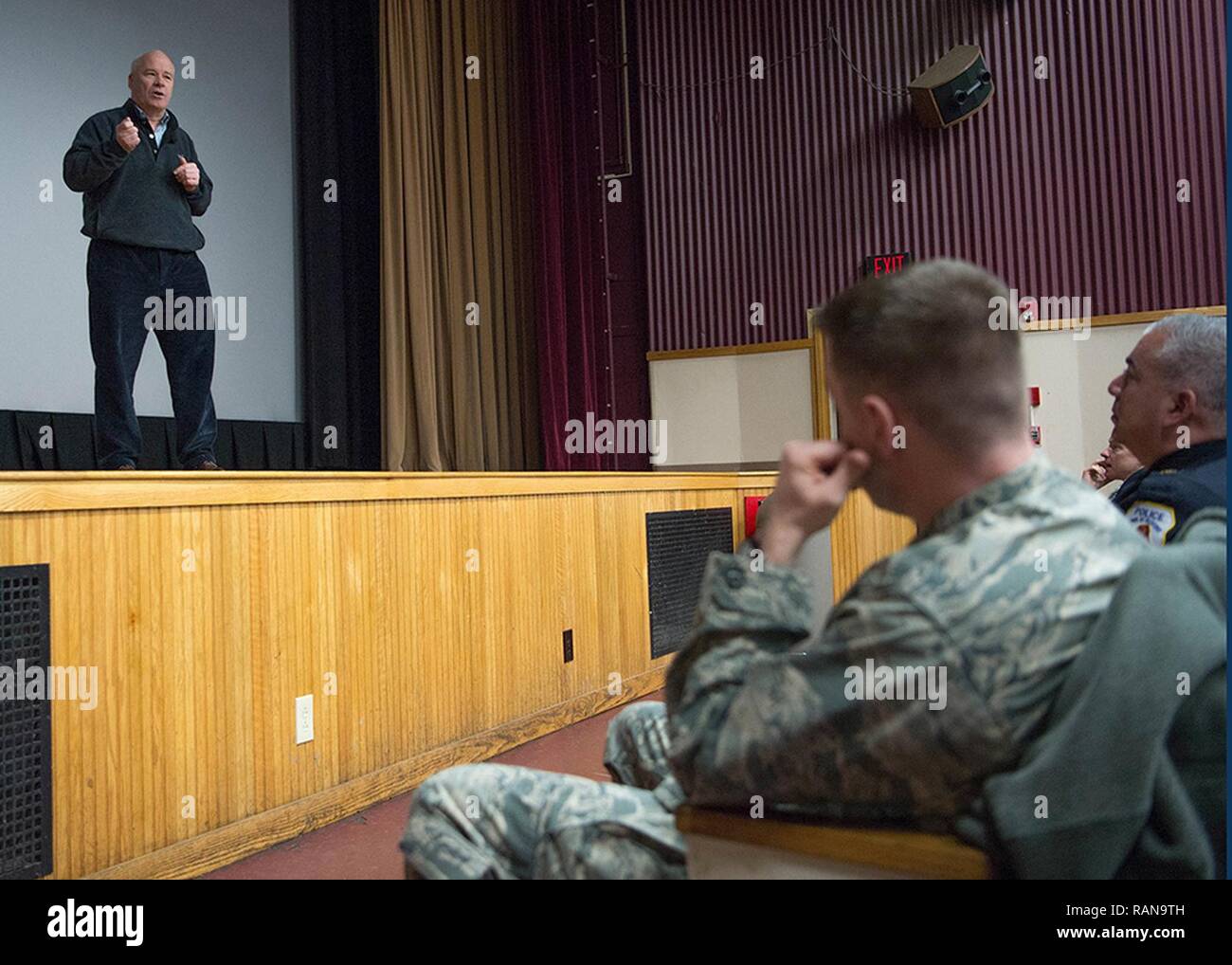 Dr. Brian O'Connor, Middlesex Recovery addiction specialist, speaks to members of the Hanscom community during an opioid abuse and prevention information session at the base theater Feb. 3. The Hanscom Family Advocacy Program joined forces with the 66th Security Forces Squadron, the Hanscom Alcohol and Drug Abuse Prevention and Treatment Program and the Central Middlesex Police Partnership to share the latest knowledge about combating the opioid problem. Stock Photo