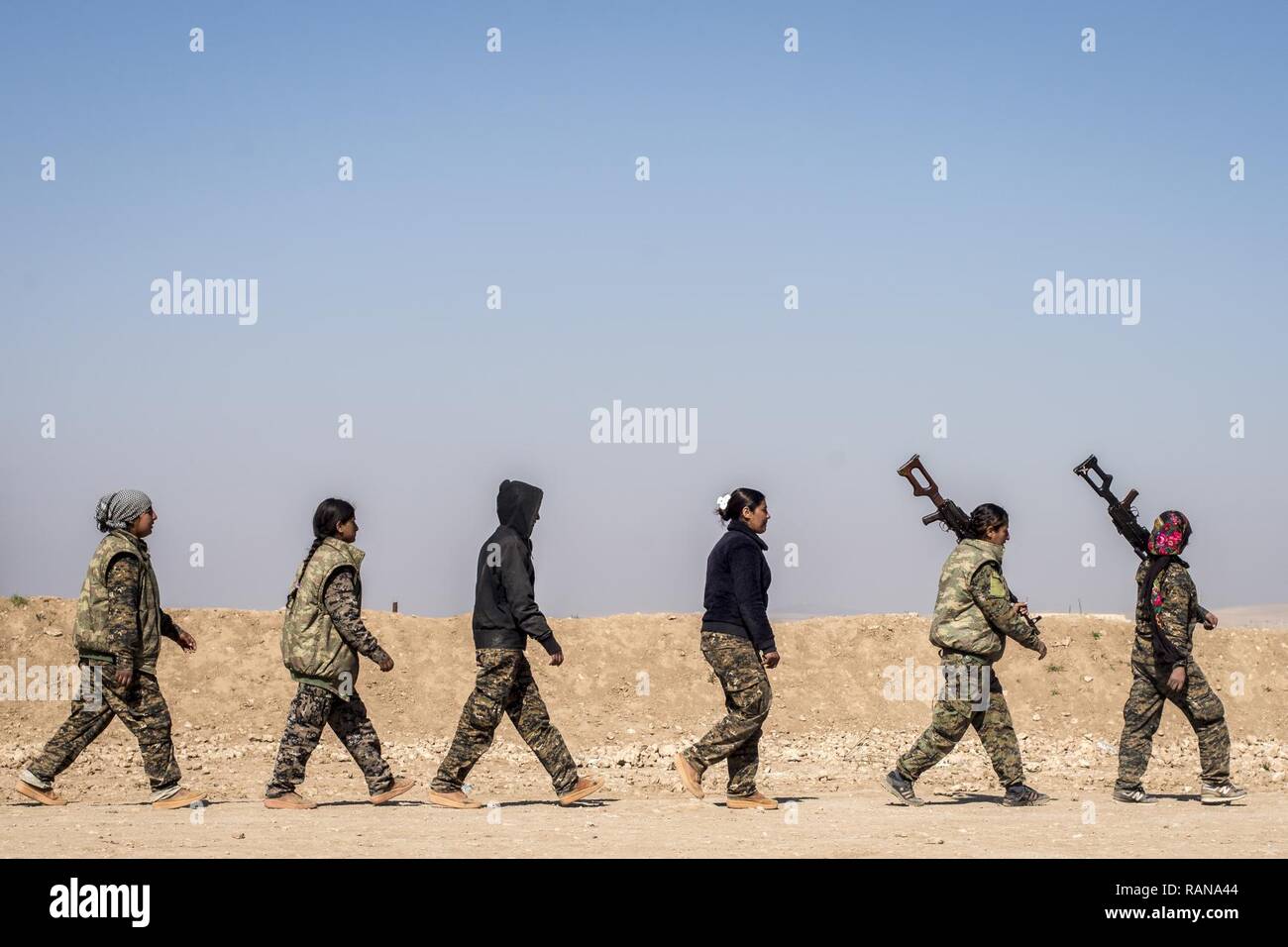Local female Manbij Military Council trainees learn marksmanship ...