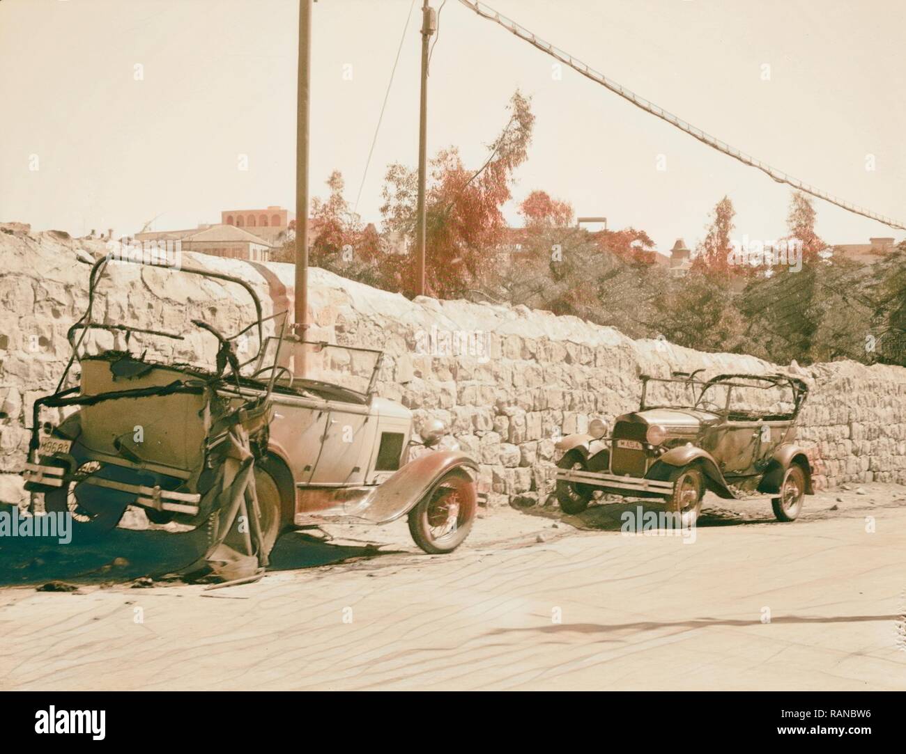 Palestine disturbances 1936 Two motor cars burnt on the highway, owners