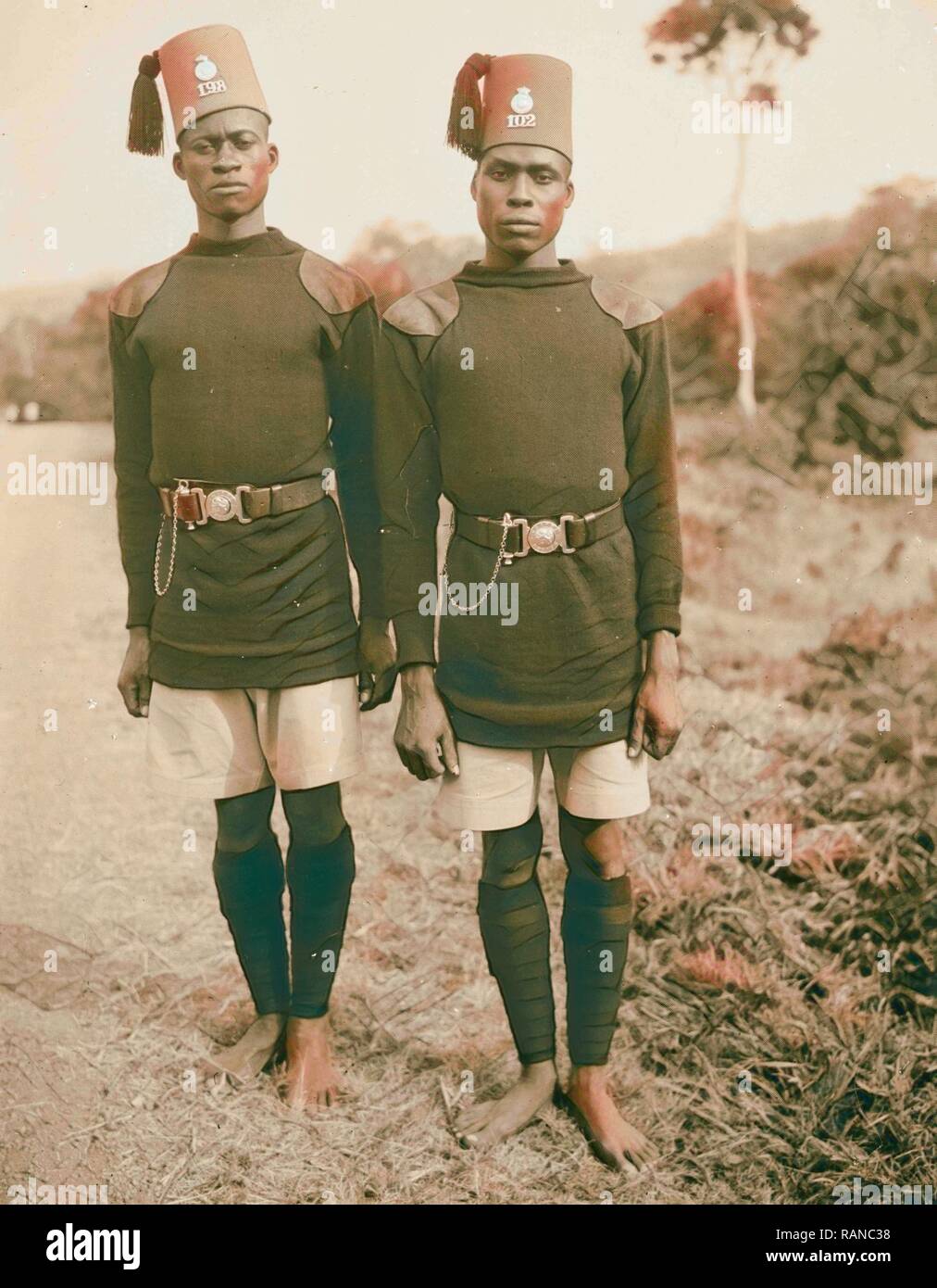 Uganda. Kampala. Two soldiers on Jinja Road, closer up. 1936, Uganda