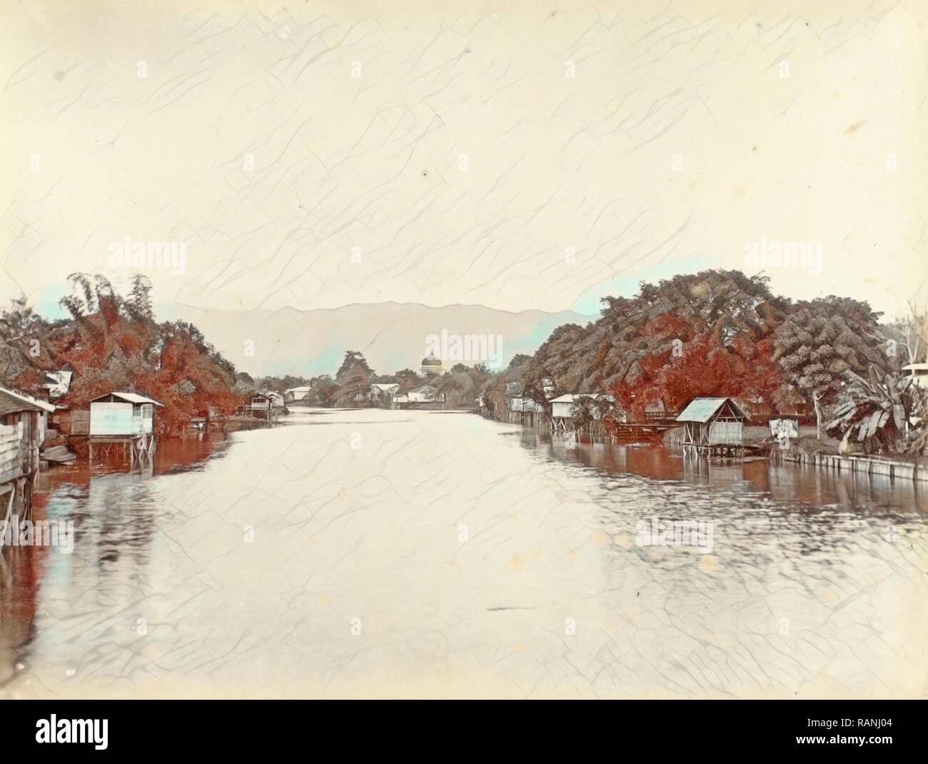 River with stilt houses in the Dutch East Indies, Anonymous, c. 1895 - c. 1905. Reimagined by Gibon. Classic art with reimagined Stock Photo