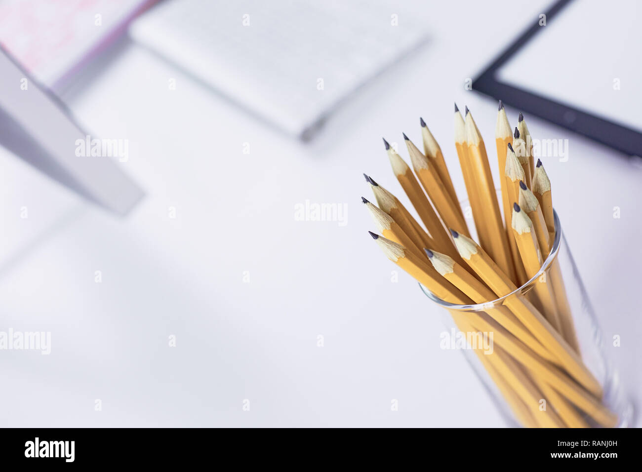 Graphite pencils in a metal gridcontainer. Concept Stock Photo Alamy