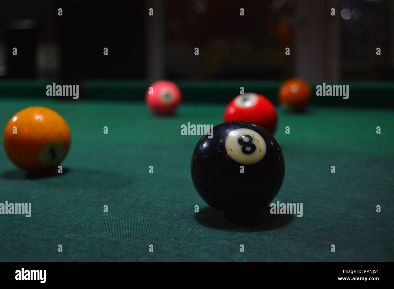 Game of pool, person playing pool and hitting balls Stock Photo Alamy