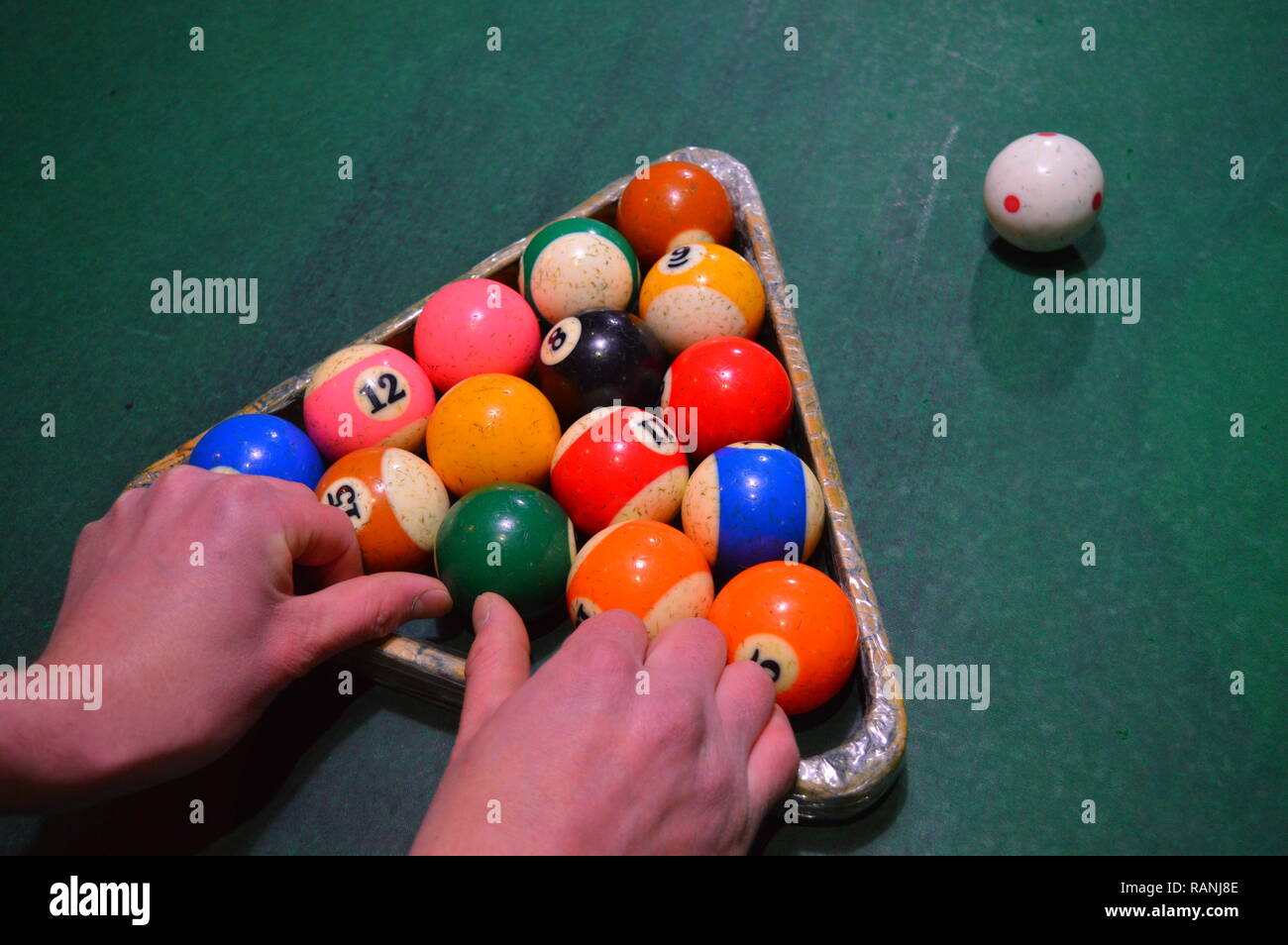 Game of pool, person playing pool and hitting balls Stock Photo Alamy