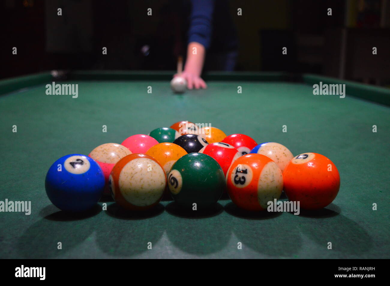 Game of pool, person playing pool and hitting balls Stock Photo Alamy