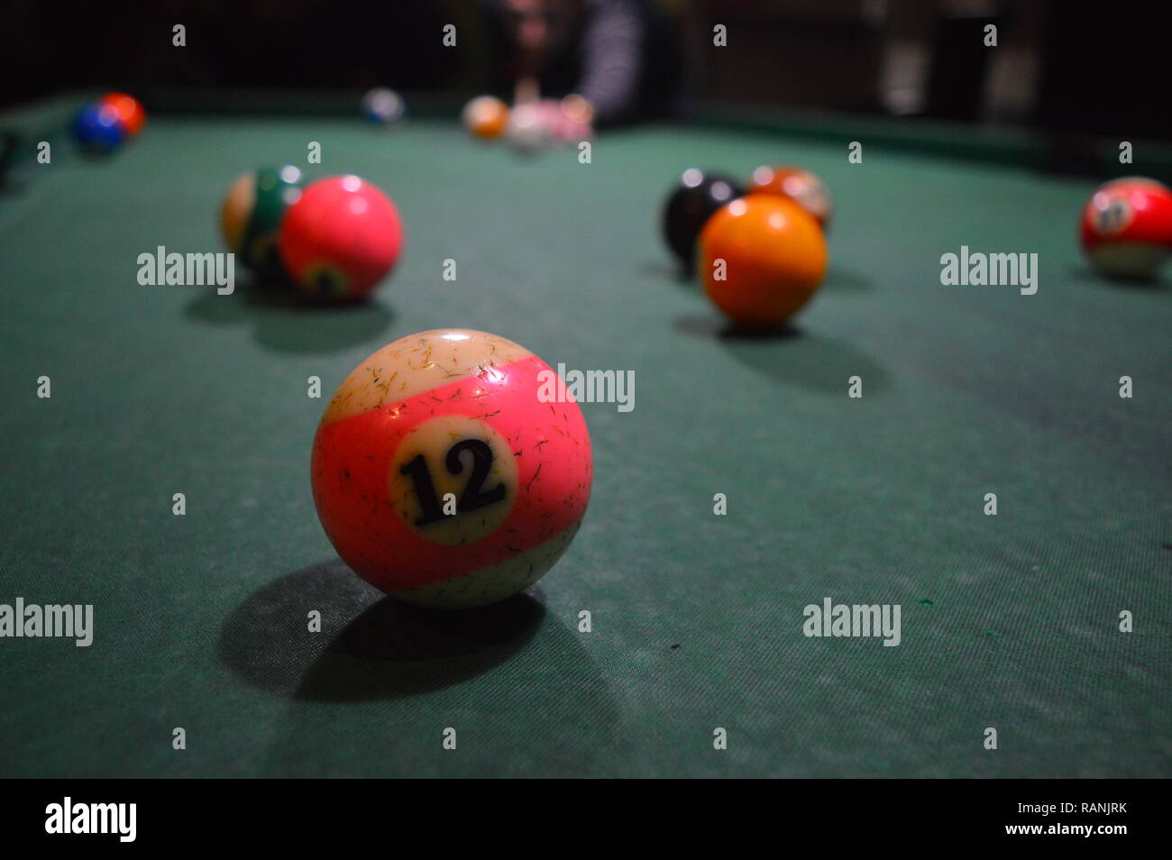 Game of pool, person playing pool and hitting balls Stock Photo Alamy