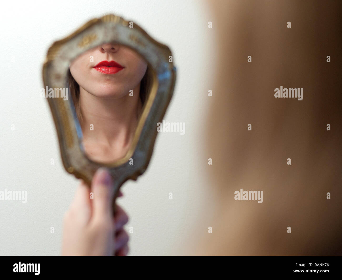 Girl mirror lipstick hi-res stock photography and images - Alamy