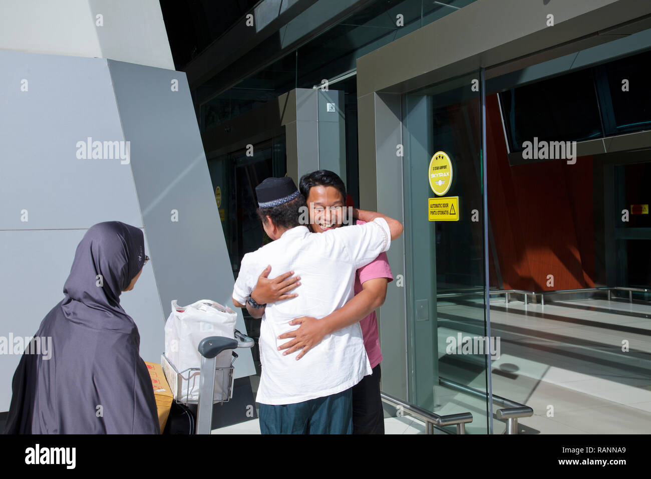 7.10, Arriving at Airport, Indonesianbook Stock Photo