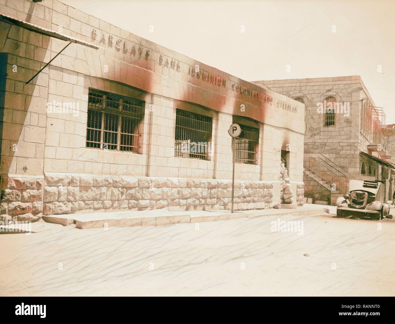 Hebron bank & post office burned by Arab rebels, 8/19/38, West Bank