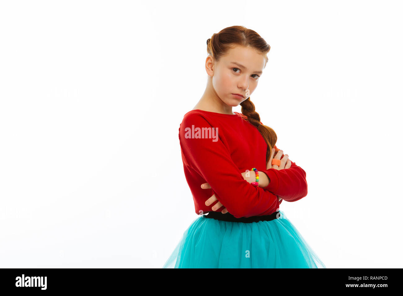 Nice beautiful girl standing alone cross handed Stock Photo
