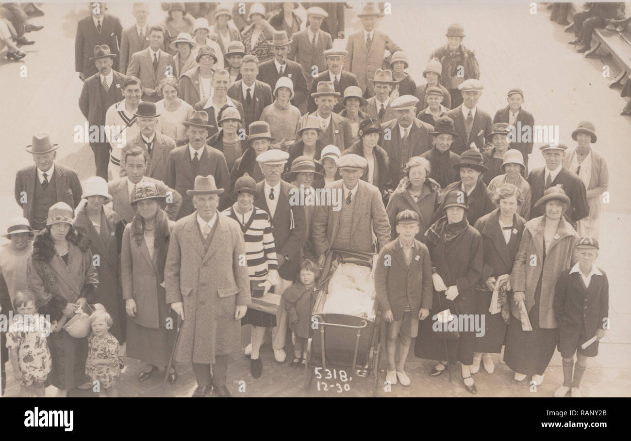 Vintage 1925 Bournemouth Photographic Postcard Showing a Group of People Waiting To Board Paddle Steamer Glen Gower. Stock Photo