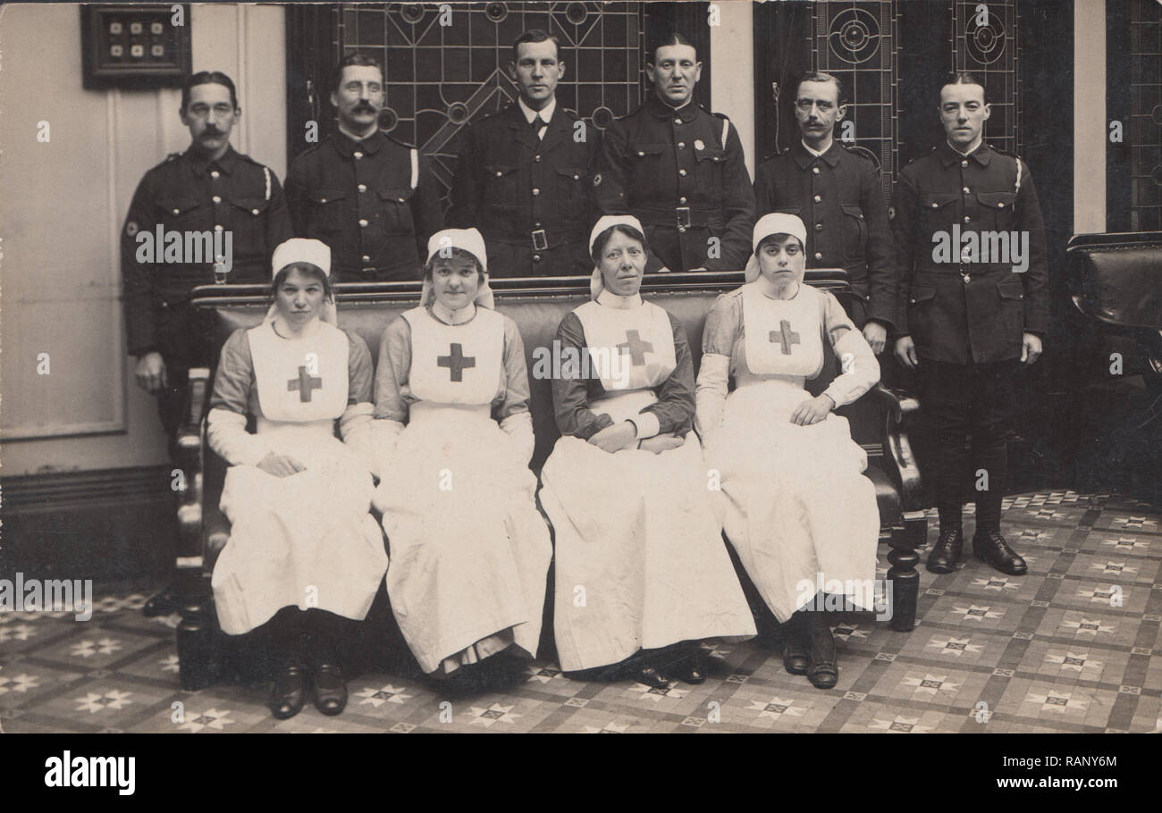Vintage Photographic Postcard Showing a Group of Red Cross Workers Stock Photo